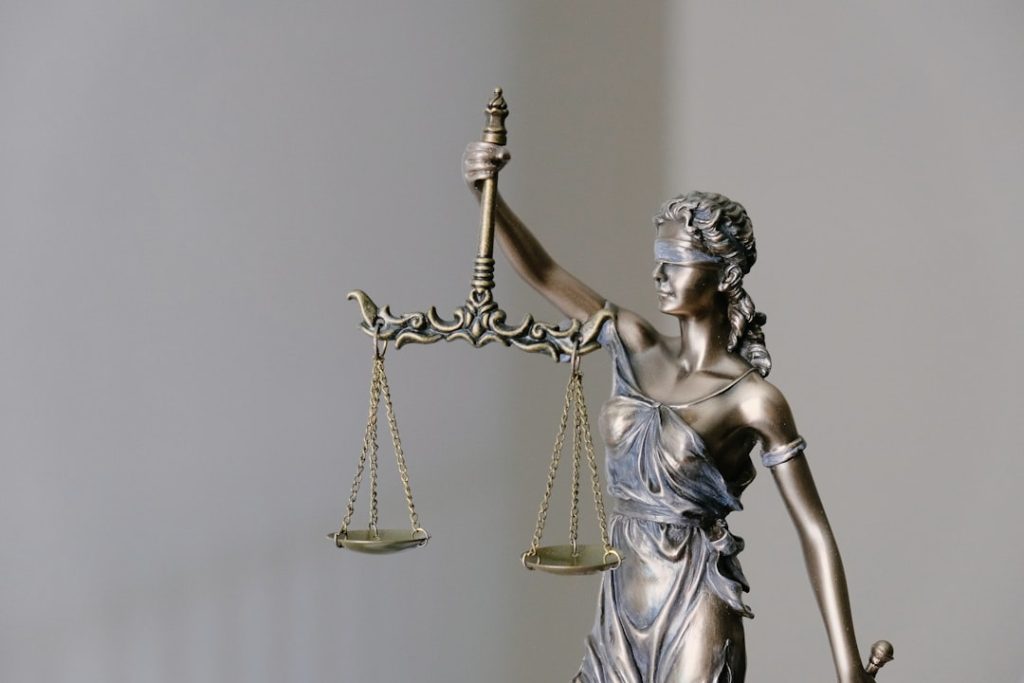 Photo Criminal vs Civil: Scales of Justice