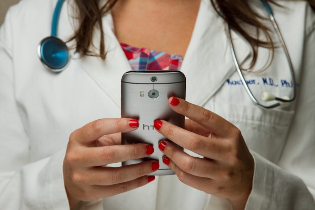 Photo Image: Stethoscope and legal documents Nouns: Stethoscope, legal documents